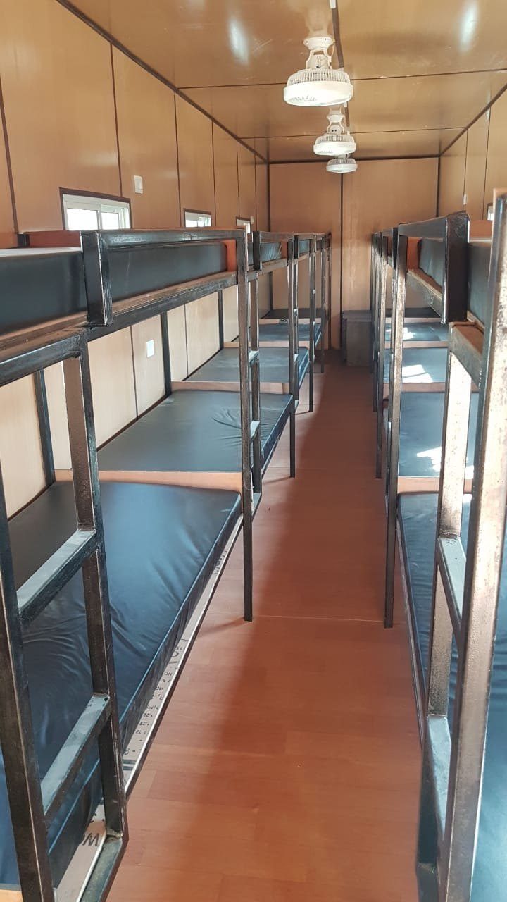 Prefabricated Bunkhouse Interior - Wooden Panelling with Bunk Beds Gujarat